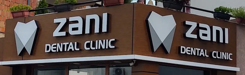 The tooth logo on the clinic’s sign